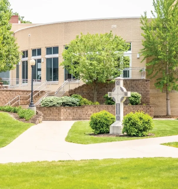 Exterior view of the chapel featuring a cross.